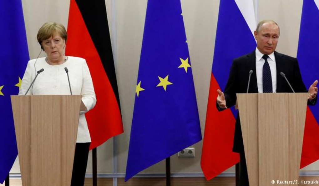 Germany's Angela Merkel meets Russia's Vladimir Putin